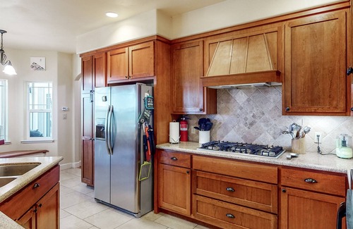 Rough and Ready House | Inviting home with balcony, fireplace, full kitchen, & washer/dryer