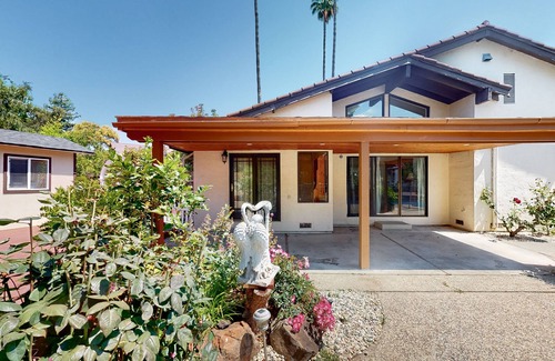 Fremont House | Inviting home with pool, fitness area, fireplace, & W/D
