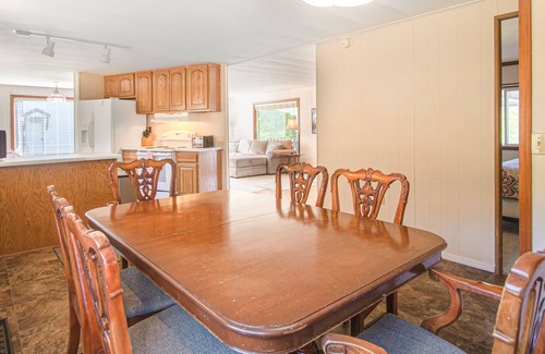 Harrison House | Inviting lakefront home with dock, fireplace, mountain view, & W/D