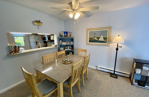 Brewster Condo | Inviting private patio, charming décor, and a wonderful location close to Pool, Tennis and Fitness.