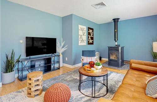 Barnstead House | Inviting riverfront home with pool, kayaks, firepit, & W/D