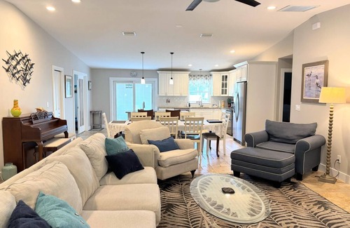 Butler Beach House | Island Escape - Water Views, Private Pool, Boat Dock, Walk to Beach
