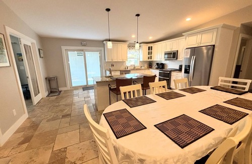 Butler Beach House | Island Escape - Water Views, Private Pool, Boat Dock, Walk to Beach
