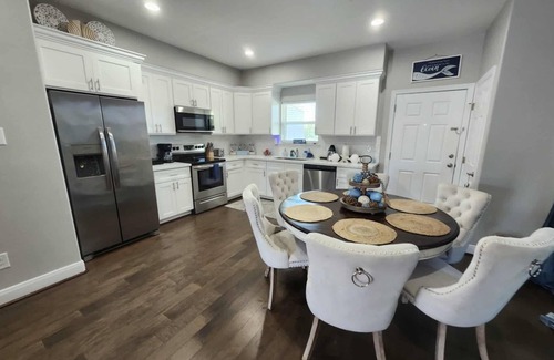 Galveston House | Island House two bedrooms two bath sleeping in the living room golf cart