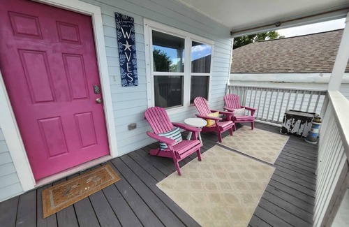 Galveston House | Island House two bedrooms two bath sleeping in the living room golf cart