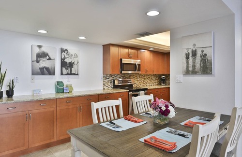 Sunset Beach Condo | Island Living! Beachfront Condo. Local Art. Heated Pool, Tennis, Spacious, Private & Secure.
