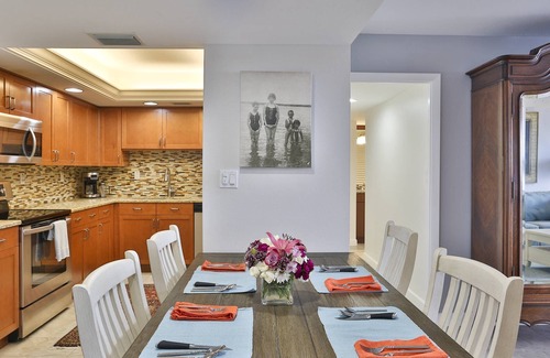 Sunset Beach Condo | Island Living! Beachfront Condo. Local Art. Heated Pool, Tennis, Spacious, Private & Secure.