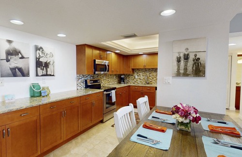 Sunset Beach Condo | Island Living! Beachfront Condo. Local Art. Heated Pool, Tennis, Spacious, Private & Secure.