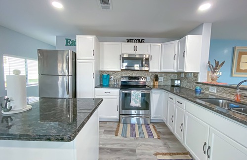 San Luis House | Island Tyme- Canal Waterfront Paradise with Sunset View!