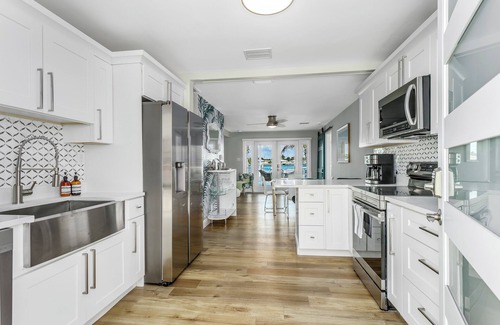 Sunset Beach House | Island Waterfront Retreat with Pool near Beach