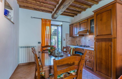 Castelnuovo di Val di Cecina Apartment | Nice apartment for 8 guests with pool, WIFI, TV, patio and pets allowed