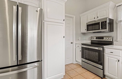 Corolla House | It's About Time: Private Hot Tub, Community Pool, Flexible Stays