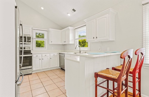 Corolla House | It's About Time: Private Hot Tub, Community Pool, Flexible Stays