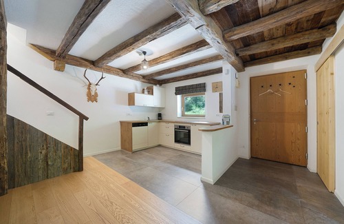 Senale San Felice Apartment | Vacation apartment "Unterurbanhof Die Eins" with mountain view, terrace with garden and sauna.