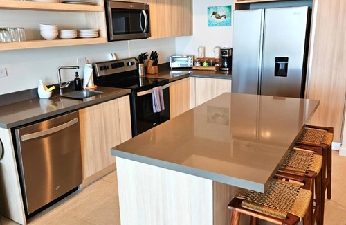 Jaco Condo | Jaco Beachfront Oasis 2-bedroom condo on Jaco Beach with AC, fitness room, WiFi