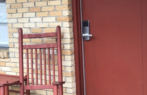 Mount Ida Apartment | JI6, King Guest Room at the Joplin Inn at entrance to the resort by RedAwning