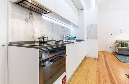 Sao Jose Apartment | JOIVY Polished 1BR Apt, close by Avenida da Liberdade