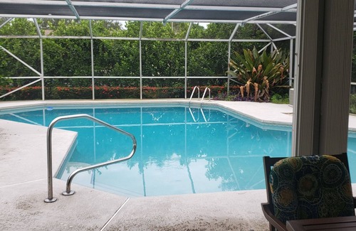 Tequesta House | Jupiter house near beach sleeps 10 , heated enclosed pool .