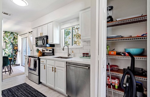 Jupiter Landing House | Jupiter Palm Oasis! Lakefront Pool Home w/Game Room, BBQ, Beach Chairs, Coffee!