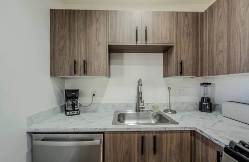 Tucson Apartment | Just down the street from the University of Arizona this 1 bedroom 1 bathroom is fully remodeled with your own dedicated electric vehicle charger .