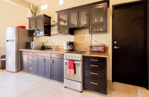 Cerritos Condo | Just steps from the Beach; Panoramic ocean views from private rooftop balcony!