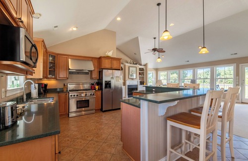 Sea Scape House | K0029 Show Boat scenic rental with pool, hot tub, and golf course views