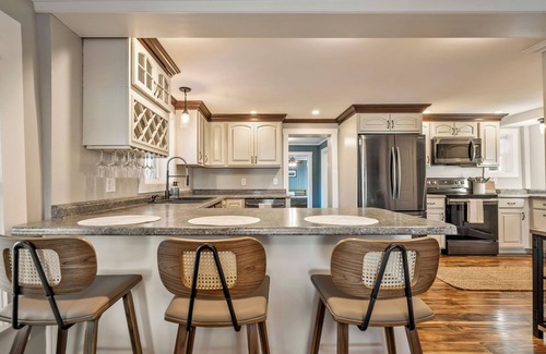 Greenville House | Katahdin View - 3 King Beds, Wraparound Deck, Fire Pit, Dog Friendly, Sleeps 14