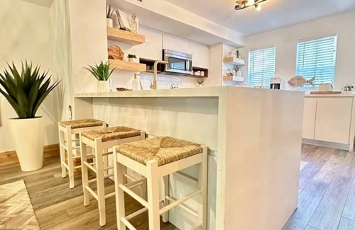 Rock Harbor Villa | Keys Escape – 4 Stories, Rooftop Views & 3 Suites