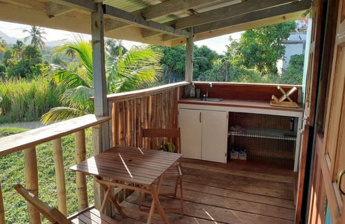 Calibishie Cottage | Kiki's Nature Cabin - studio style cottage with a stunning view