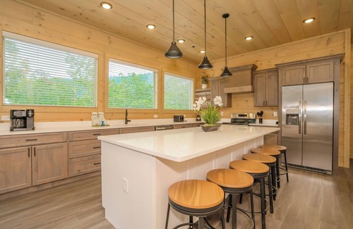 Sevierville Cabin | Kilimanjaro: Indoor Pool! Hot Tub, Wifi, Game Room, Modern, Wooded Views!