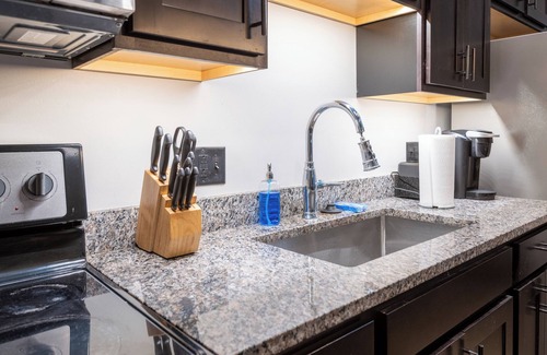 Strip District Apartment | King Bed - Heart of PB - Jaw-Dropping Rooftop+Gym