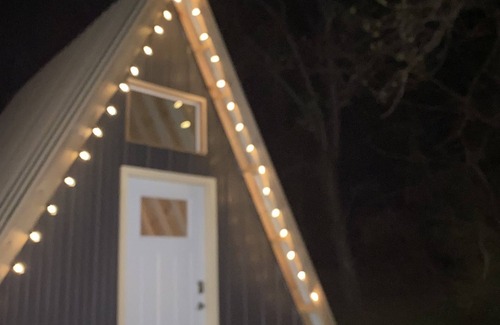 Mammoth Cave RV Rental | King bed in Tulip Glamping Aframe at Noble Pine Campground