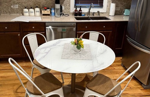 North Chicago Apartment | King Bed Private Backyard Grill and Fireplace