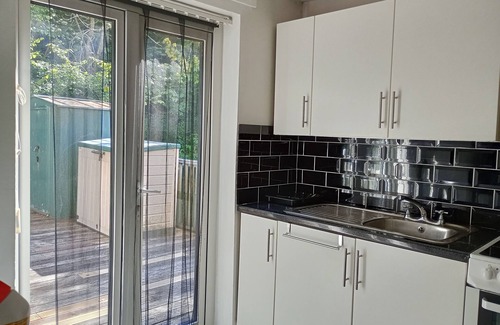 Bont Newydd Cottage | Kingfisher Cottage- river, rambling and relaxing, in a beautiful holiday park