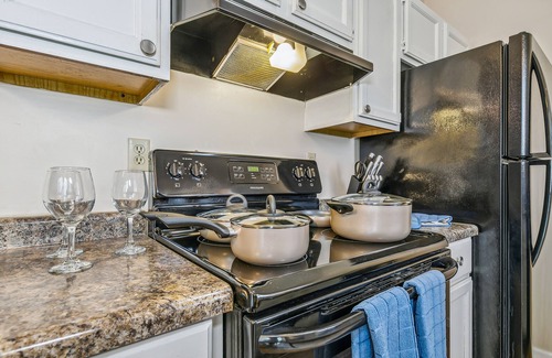 Wichita House | Kings, 75" TV & Swing Duplex in West Wichita