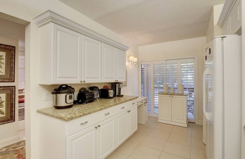Kings Lake Condo | Kings Lake First Floor Corner Condo with 2 Lanais and Walk to the Community Pool