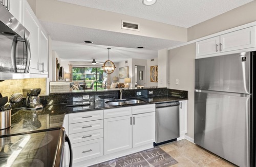 Arcadian Shores Villa | Kingston WHP 2B Ground level Villa w/pool/beach