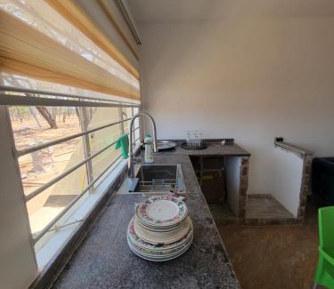 Central House | Kitumba Lodge, 1 bed, kitchen & Lounge