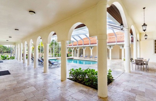 Rural Estates House | Knickerbocker Estate: Exclusive 9-BR Getaway in Naples. Enjoy Private Pool, Outdoor Dining, and Expansive Grounds, Experience Tranquility with Easy Access to Naples' Best!