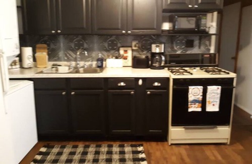 Edinboro Cottage | Knotty Pine, cozy and eclectic cottage