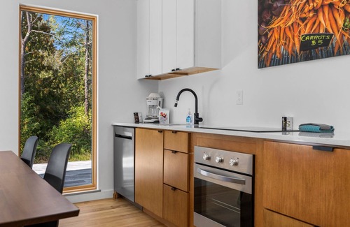 Acme House | KOTI 8 (Three Bedroom) Traverse City's Scandinavian Cabins, vacation home on TART & mins to Traverse