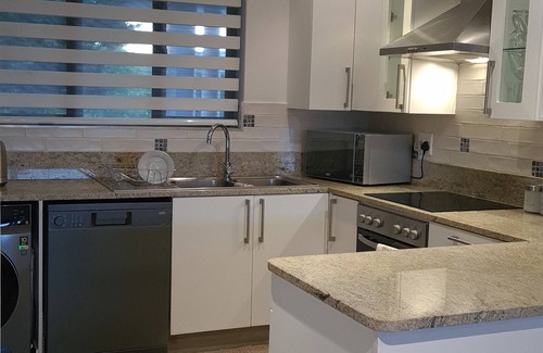 Greater Johannesburg Metropolitan Area House | KRJSA Townhouse- Bryanston nCentrally located to shopping Malls and nightlife.
