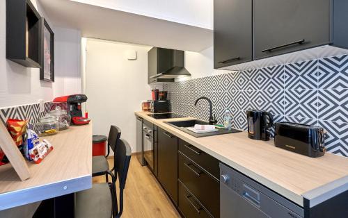 Nevers Apartment | L'Oscar, Expérience Cinema Room avec Netflix, Canal Plus, Prime Vidéo chez les M by PRIMO C0NCIERGERIE