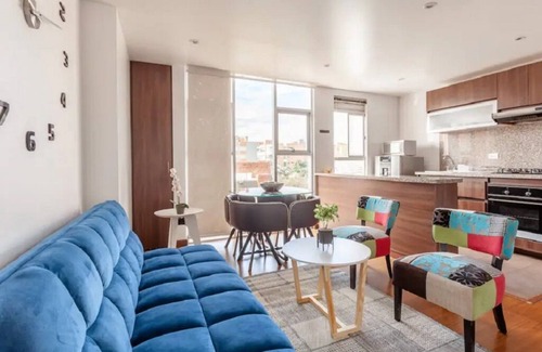 Usaquen Apartment | La Calleja Warm and Illuminated