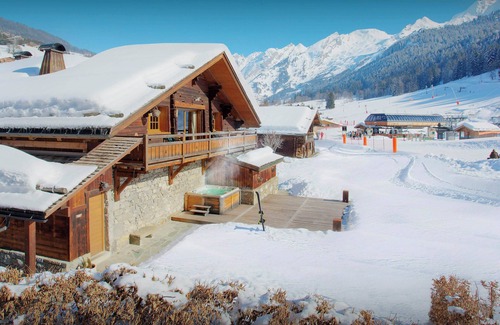 La Clusaz Ski Chalet | La Ferme à Juju - alpine ski-in ski-out for 8 spa & views - OVO Network