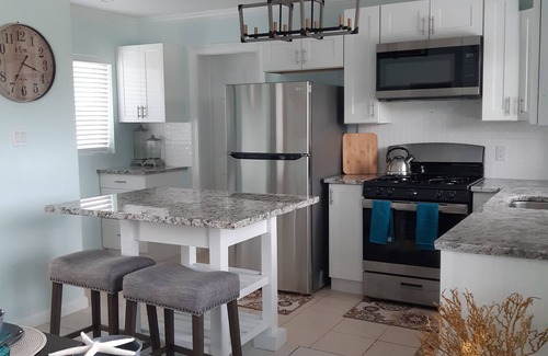 Treasure Cay Villa | La Nueva Beach home two minute walk to beach & 1 minute walk to the golf course