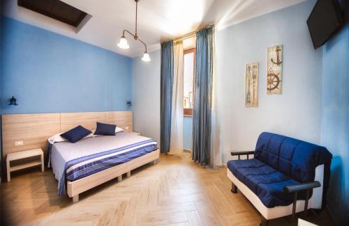 Maratea House | La stanza dell'angolo