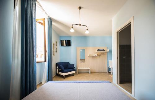 Maratea House | La stanza dell'angolo