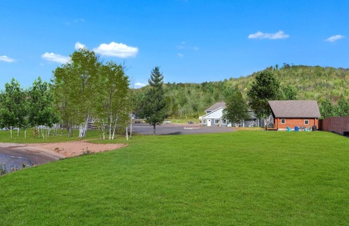 Houghton Cabin | Lake Access Cabin with Hot Tub, Trail Access, Sauna – Across the lake from MTU
