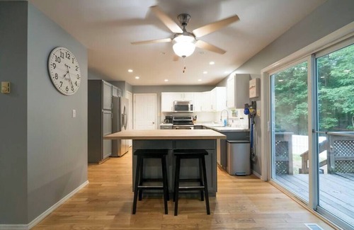 East Stroudsburg House | Lake Adjacent Home w/Hot Tub, Game Room, Boats, Fenced Yard